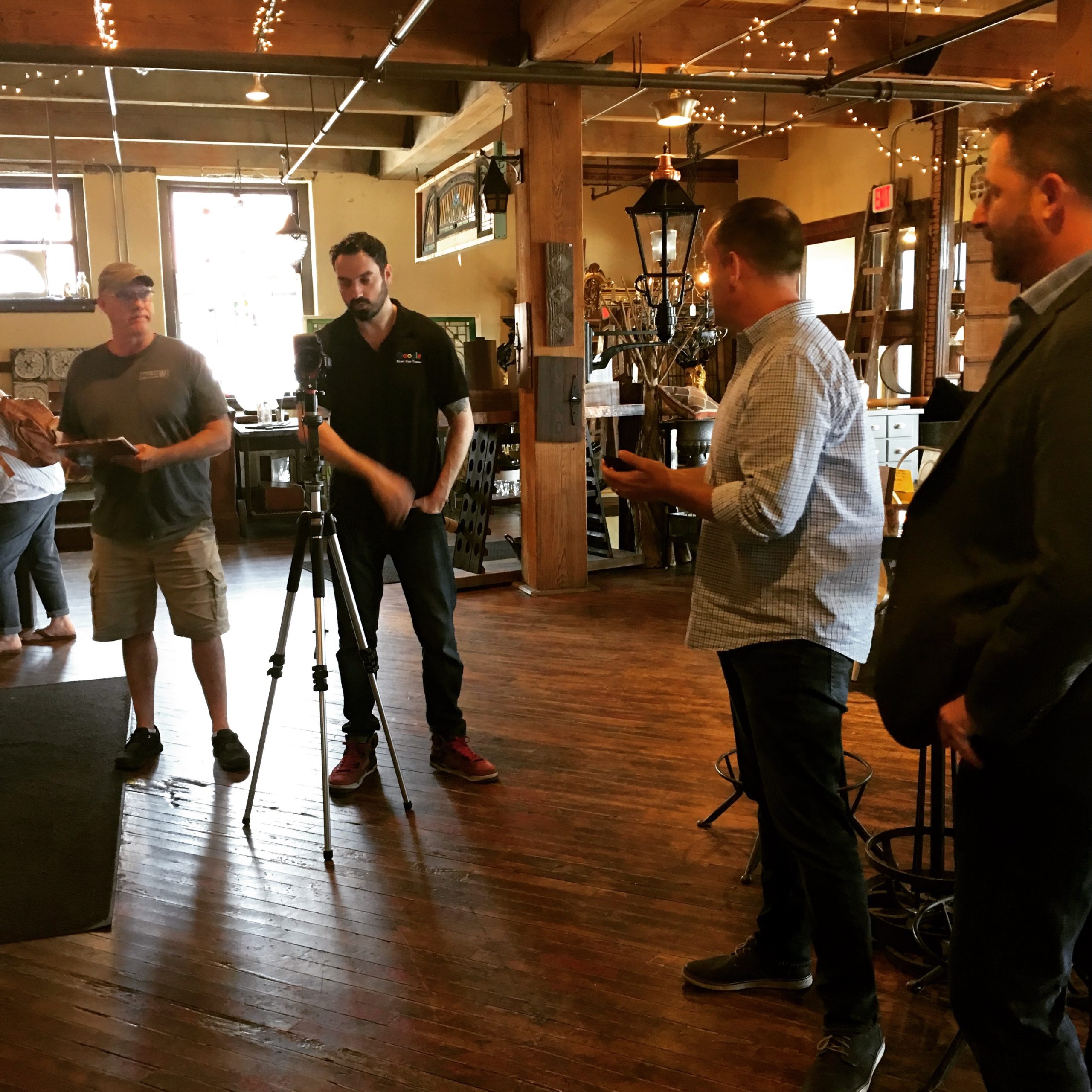 Video production crew filming on location