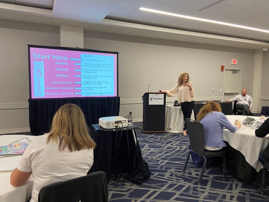 Liliana Grace presenting a marketing workshop